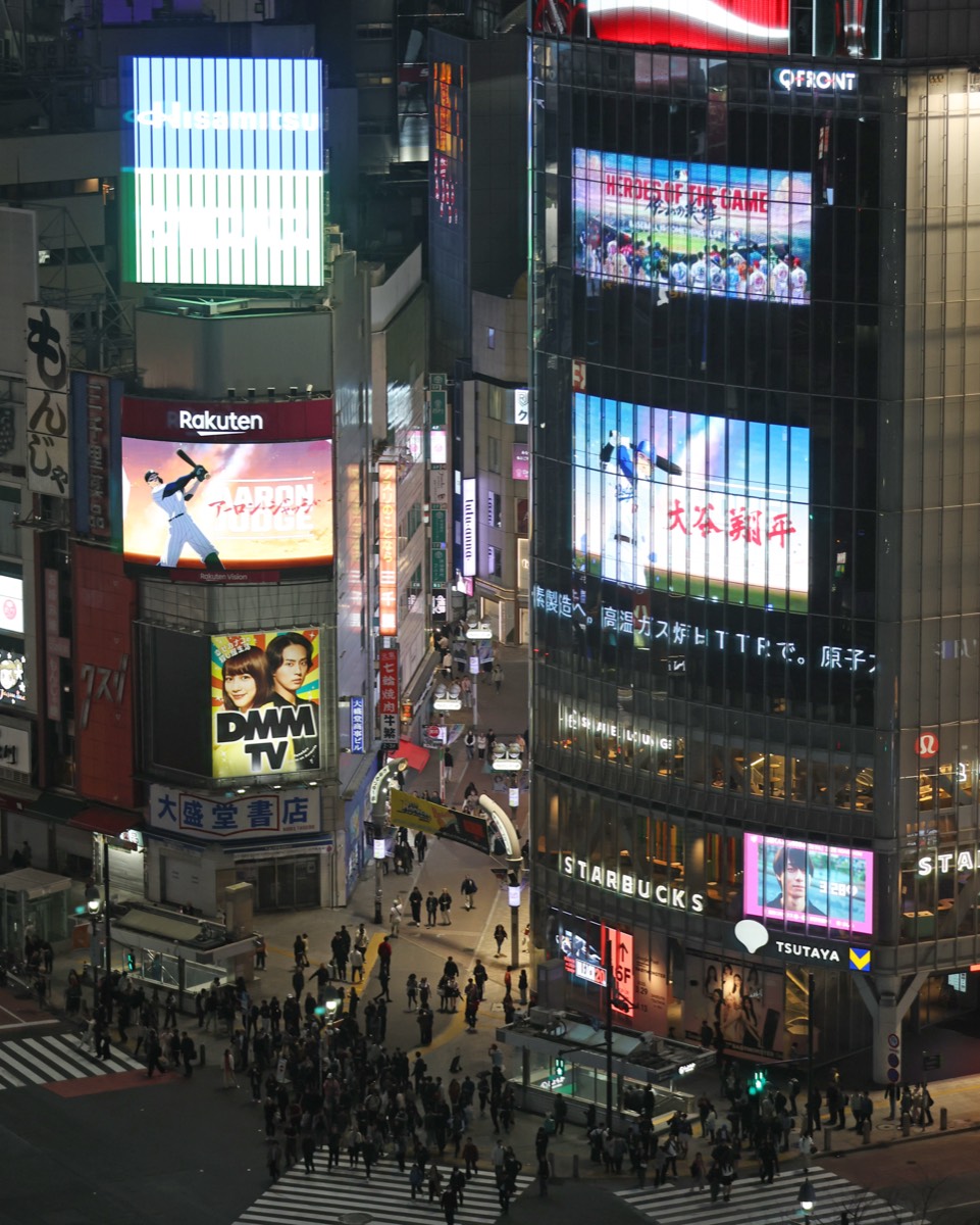 Heroes of the Game campaign on screens at Shibuya Crossing, Tokyo